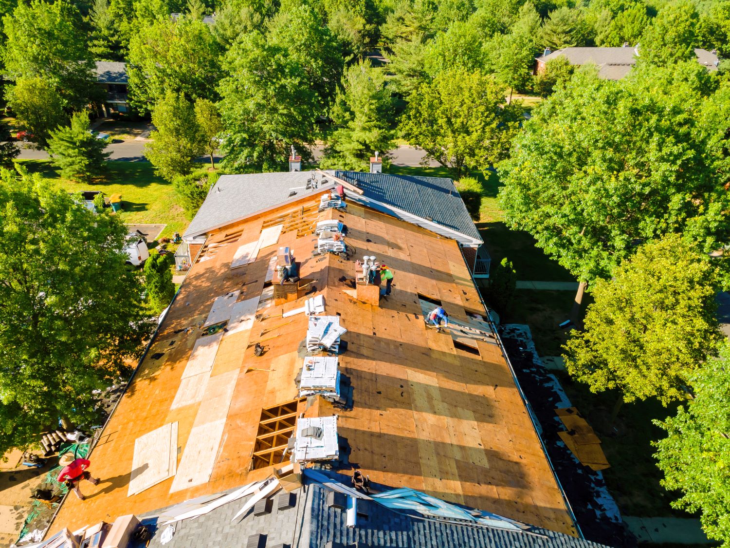 During repair of apartment buildings roof, new shingles were installed and old ones were replaced